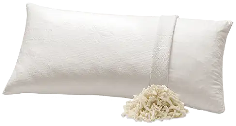 Ein kleineres, längliches Kissen mit zwei weißen, übereinander liegenden Stoffüberzügen. Davor ist ein kleines Häufchen eines Holzspäne-artigen Füllmaterials zu sehen.